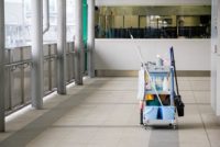 Cleaning equipment with cart on the floor in office building