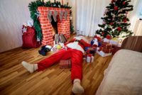 Stressed out Santa passed out on floor