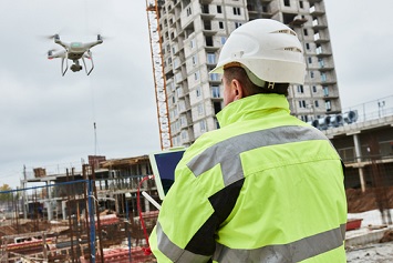 Drone inspecting a construction workplace